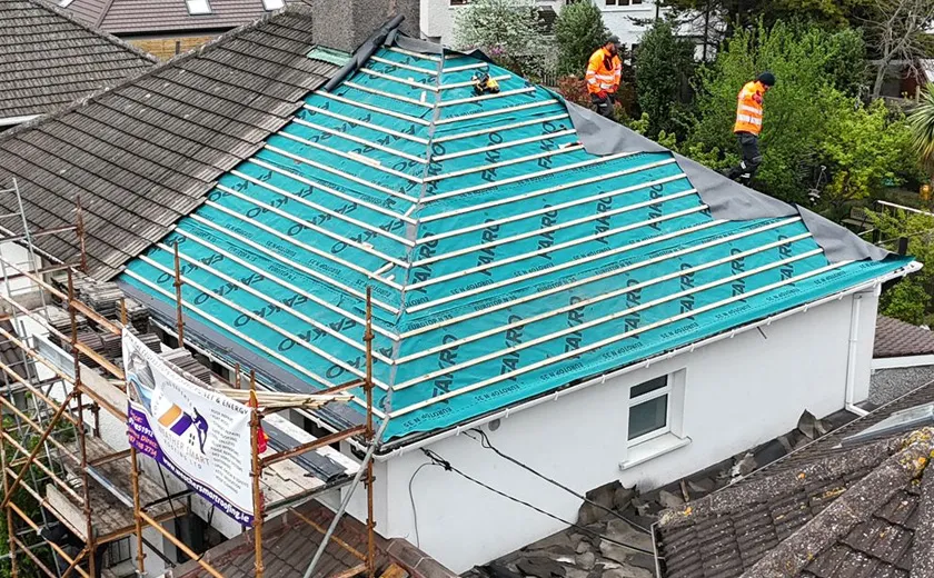 Gutter repairs Cork: new gutters on a house